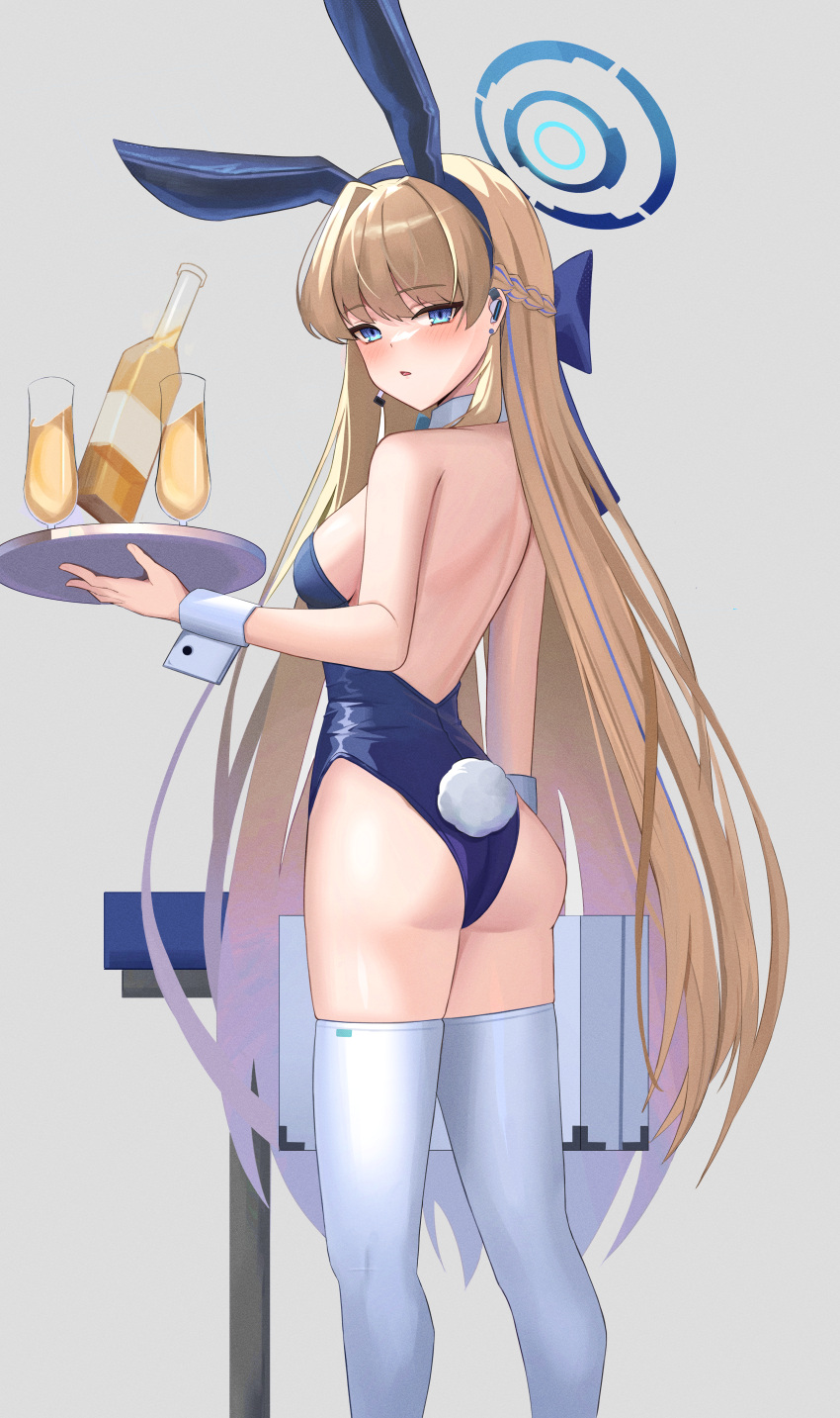 1girl absurdres animal_ears ass bare_arms bare_shoulders blonde_hair blue_archive blue_eyes blue_hairband blue_leotard blush fake_animal_ears fake_tail feet_out_of_frame from_behind grey_background hair_ornament hairband highres holding leotard long_hair looking_at_viewer looking_back parted_lips playboy_bunny rabbit_ears rabbit_tail simple_background solo standing tail thighhighs thighs toki88909 toki_(blue_archive) toki_(bunny)_(blue_archive) tray white_thighhighs wrist_cuffs