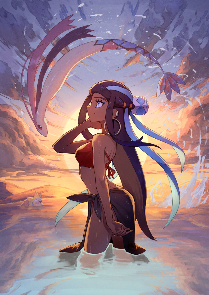 1girl bikini black_hair blue_eyes commentary_request dark-skinned_female dark_skin drednaw ear_piercing earrings highres hoop_earrings jewelry jumping kuroi_susumu milotic mountainous_horizon nessa_(pokemon) ocean piercing pokemon pokemon_(creature) pokemon_(game) pokemon_swsh red_bikini sarong smile swimsuit wading wet