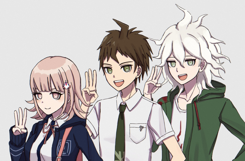 1girl 2boys ahoge arironpawa backpack badge bag black_jacket breast_pocket brown_eyes brown_hair collarbone danganronpa_(series) danganronpa_2:_goodbye_despair galaga green_jacket green_necktie hair_ornament hand_up highres hinata_hajime hood hood_down hooded_jacket jacket komaeda_nagito light_brown_hair medium_hair messy_hair multiple_boys nanami_chiaki neck_ribbon necktie open_clothes open_jacket pink_eyes pink_ribbon pocket print_shirt ribbon shirt short_hair short_sleeves two-tone_shirt w white_hair