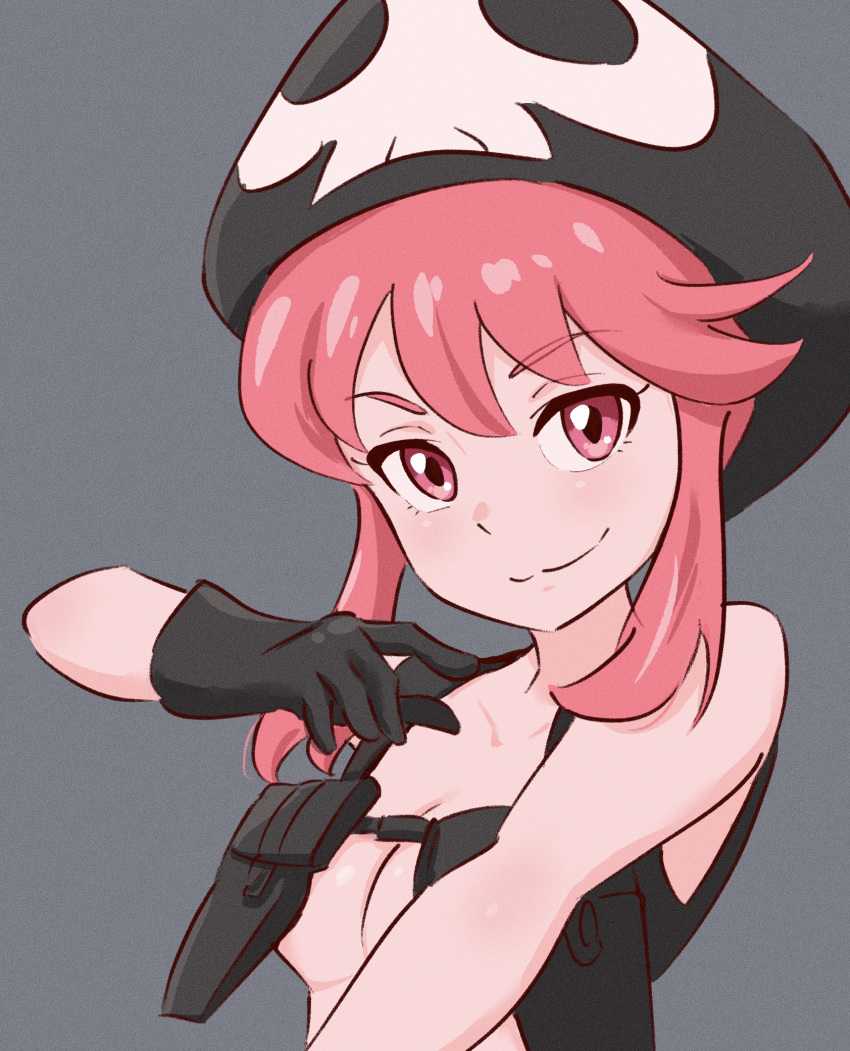 1girl :3 bare_shoulders beret black_gloves black_headwear breasts chest_harness cleavage close-up closed_mouth collarbone commentary film_grain gloves grey_background hair_up hand_up harness hat highres holster jakuzure_nonon kill_la_kill looking_at_viewer nudist_beach_uniform pink_eyes pink_hair portrait revealing_clothes shoulder_holster sidelocks simple_background skull_print smile smug solo tsunemoku