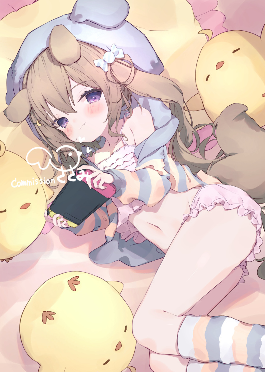 1girl animal_ear_headwear animal_ears azur_lane bare_shoulders bloomers blue_cardigan blush brown_hair camisole candy_hair_ornament cardigan child closed_mouth collarbone commentary_request commission crescent crescent_hair_ornament crop_top crossed_bangs dog_ears dog_girl dog_tail fang female_child flat_chest food-themed_hair_ornament frills hair_between_eyes hair_ornament hairclip handheld_game_console hatosasami highres holding holding_handheld_game_console hood hood_up hooded_cardigan kneehighs long_hair long_sleeves lying manjuu_(azur_lane) midriff nagatsuki_(azur_lane) navel nintendo_switch on_side pink_bloomers pink_camisole playing_games puffy_long_sleeves puffy_sleeves purple_eyes skeb_commission skin_fang socks solo spaghetti_strap striped striped_cardigan striped_socks tail thighs twintails underwear