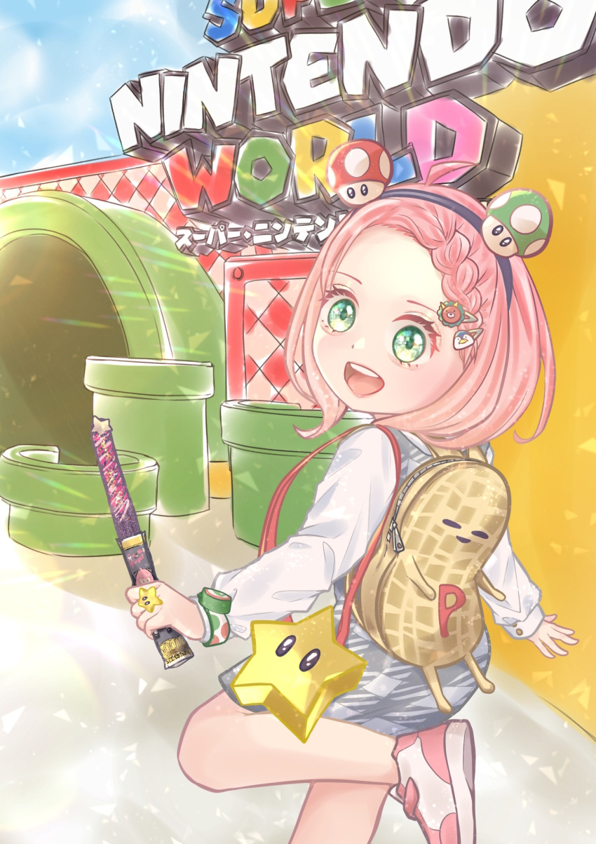 1girl ahoge alternate_hairstyle anya_(spy_x_family) backpack bag braid child female_child green_eyes hair_ornament hairclip highres holding holding_wand kirara_(k43mf) knee_up long_sleeves looking_at_viewer medium_hair open_mouth pink_footwear pink_hair power_star_(mario) shirt shoes smile sneakers solo spy_x_family super_mushroom super_nintendo_world teeth upper_teeth_only wand white_shirt