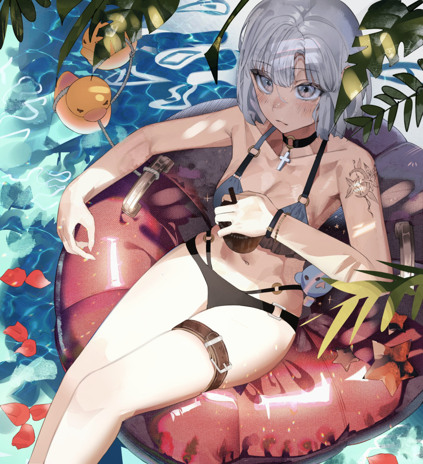 1girl absurdres belt bikini black_bikini black_choker black_wristband blush bracelet breasts brown_belt choker closed_mouth commentary cross cross_choker drinking_straw english_commentary feet_out_of_frame grey_eyes grey_hair hani_haya highres holding jewelry looking_at_viewer medium_breasts navel o-ring o-ring_bikini o-ring_choker original petals plant red_innertube rope rubber_duck short_hair shoulder_tattoo sitting solo swimsuit tattoo thigh_belt thigh_strap water