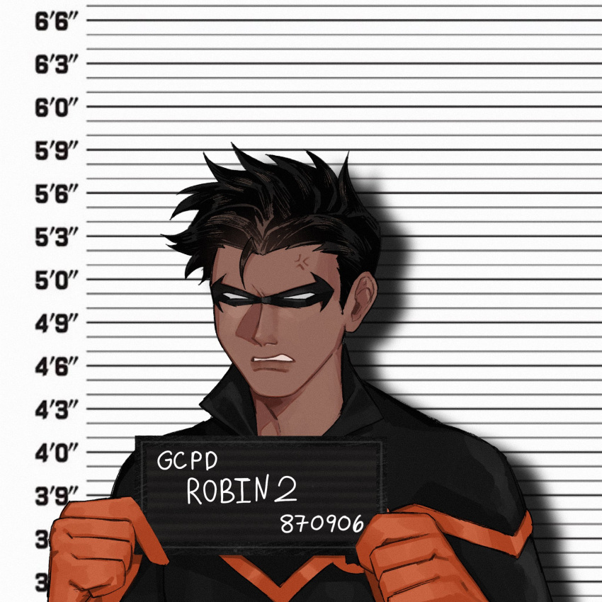 1boy batman_(series) bodysuit calladraws1 damian_wayne dc_comics domino_mask english_commentary english_text gloves height_chart highres holding holding_sign looking_at_viewer male_child male_focus mask mugshot orange_gloves robin_(dc) sign solo teeth