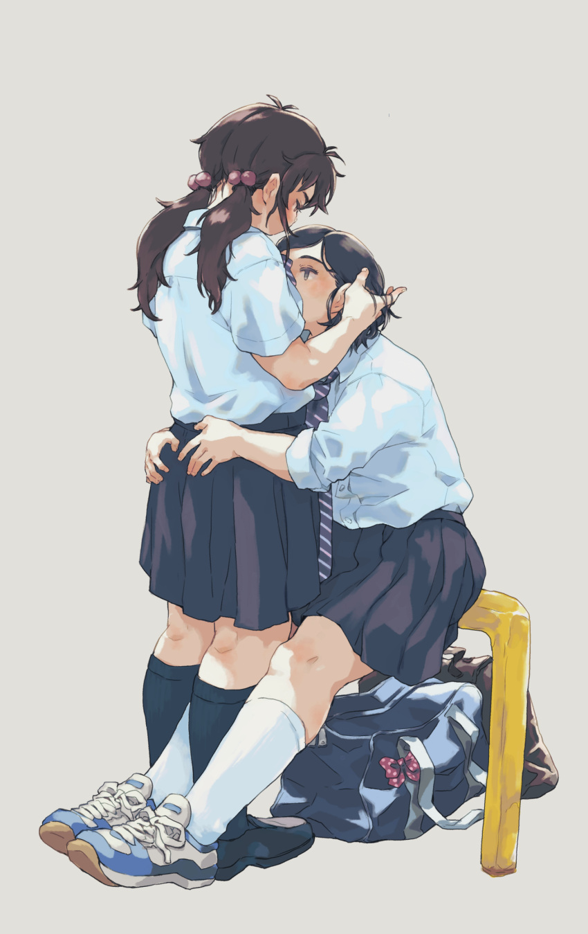 2girls absurdres arms_around_waist black_hair blue_eyes brown_hair hand_in_another's_hair highres hug kneehighs long_hair looking_at_another looking_down m_k multiple_girls necktie necktie_removed original school_uniform shoes sitting sneakers socks tote_bag twintails yuri