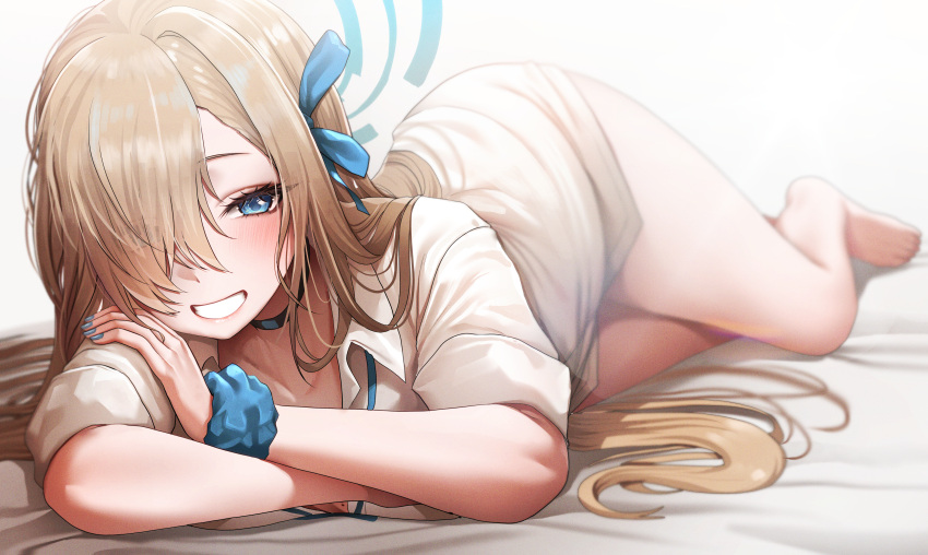 1girl absurdres asuna_(blue_archive) asymmetrical_bangs bare_legs barefoot bed_sheet blue_archive blush collarbone crossed_arms doyoon_7 fingernails hair_over_one_eye halo highres light_brown_hair looking_at_viewer lying nail_polish no_pants one_eye_covered school_uniform scrunchie shirt smile solo white_shirt wrist_scrunchie