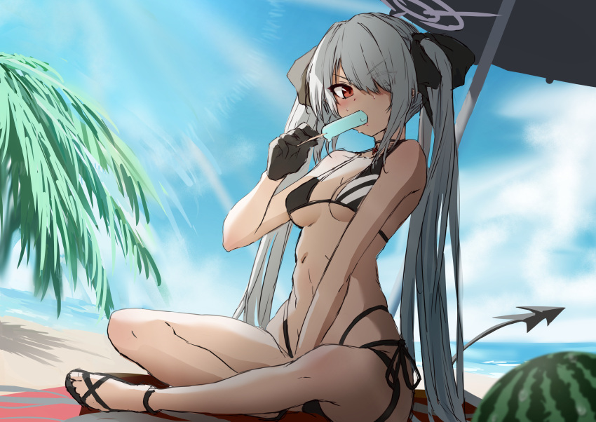 1girl absurdres beach bikini black_bikini black_footwear black_gloves black_ribbon blue_archive blue_sky blush breasts commentary_request dark_skin day eating food fruit gloves grey_hair hair_ribbon halo hand_up highres holding holding_food holding_ice_cream holding_popsicle ice_cream indian_style iori_(blue_archive) iori_(swimsuit)_(blue_archive) long_hair looking_at_viewer mogurii ocean official_alternate_costume outdoors popsicle red_eyes ribbon sandals sitting sky small_breasts solo swimsuit tail toes tree twintails watermelon