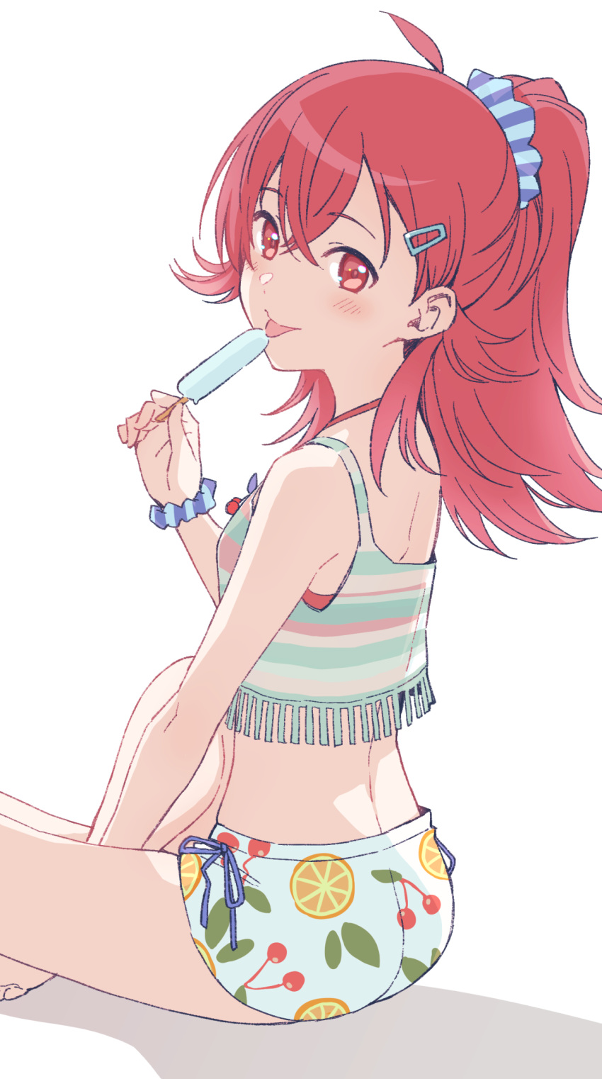 1girl ahoge back bare_shoulders bikini blue_scrunchie blush breasts dot_nose from_side hair_between_eyes hair_ornament hair_scrunchie hairclip hand_up highres holding_popsicle idolmaster idolmaster_shiny_colors indian_style komiya_kaho long_hair looking_at_viewer medium_breasts multicolored_bikini multicolored_clothes nonaka_nono ponytail print_bikini red_eyes red_hair scrunchie simple_background sitting smile solo striped striped_bikini striped_scrunchie swimsuit tongue tongue_out white_background wrist_scrunchie