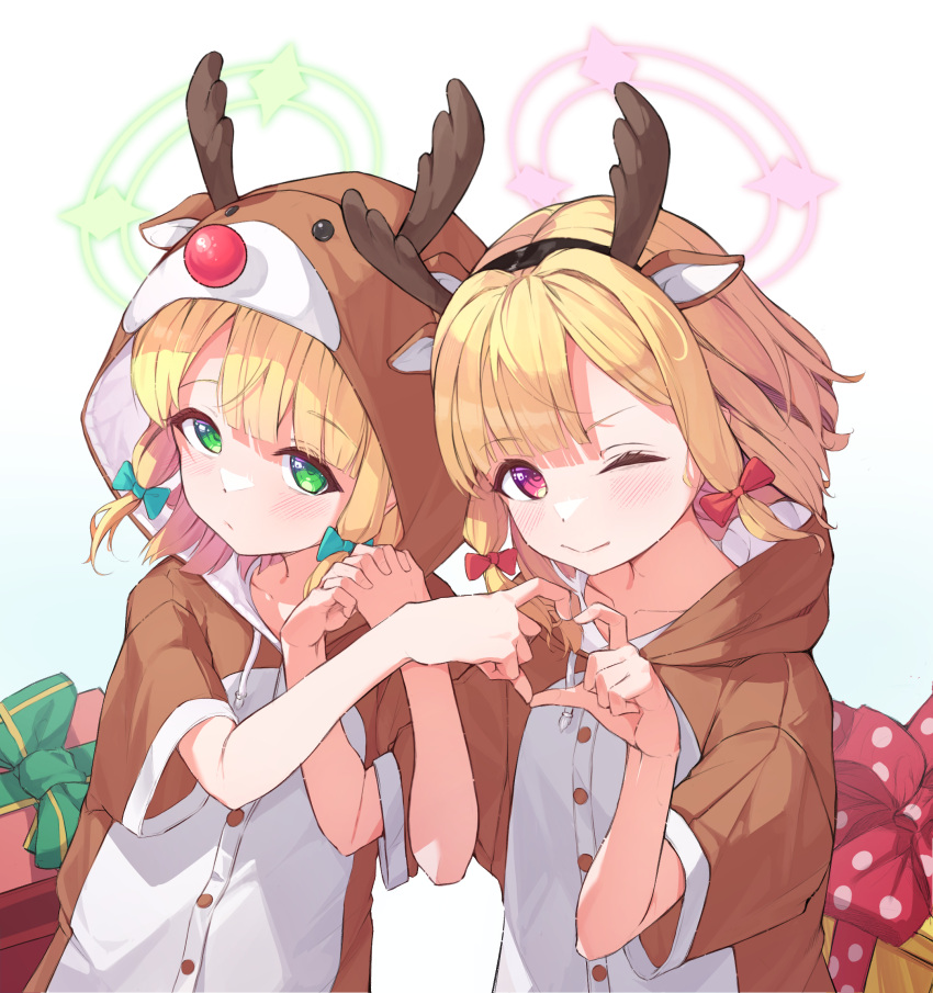 2girls animal_costume antlers blonde_hair blue_archive blush bow box closed_mouth collarbone gift gift_box green_bow green_eyes green_halo hair_bow halo heart heart_hands heart_hands_duo highres looking_at_viewer midori_(blue_archive) momoi_(blue_archive) multiple_girls naretsuro one_eye_closed pink_halo red_bow red_eyes reindeer_antlers reindeer_costume short_hair short_sleeves siblings sisters twins upper_body