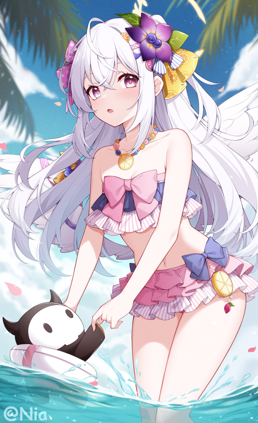 1girl absurdres angel_wings azusa_(blue_archive) azusa_(swimsuit)_(blue_archive) bare_arms bare_legs bare_shoulders bikini blue_archive blush bow chinese_commentary collarbone crossed_bangs day feathered_wings feet_out_of_frame flat_chest flower food_print frilled_bikini frills fruit_print hair_between_eyes hair_flower hair_ornament highres long_hair official_alternate_costume open_mouth orange_print outdoors palm_leaf partially_submerged pink_bikini pink_bow pink_eyes poinia purple_bikini purple_bow purple_flower solo swimsuit twitter_username water white_hair white_wings wings