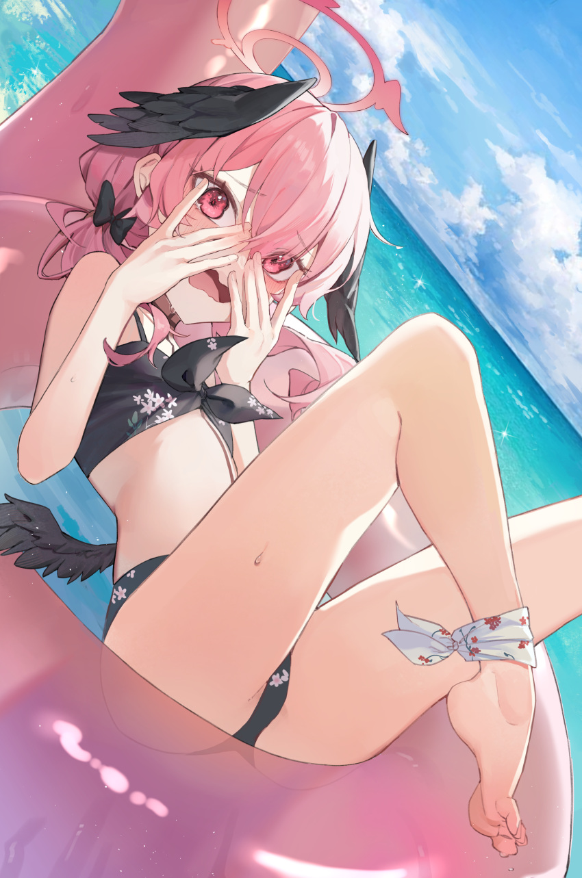 1girl absurdres ankle_ribbon bare_legs bare_shoulders barefoot bikini black_bikini black_bow black_wings blue_archive blue_sky blush bow breasts cloud day double-parted_bangs feathered_wings feet flat_chest floral_print front-tie_bikini_top front-tie_top hair_bow halo head_wings highres koharu_(blue_archive) koharu_(swimsuit)_(blue_archive) leg_ribbon long_hair looking_at_viewer low_twintails low_wings may.l ocean official_alternate_costume pink_eyes pink_hair pink_halo print_bikini red_halo ribbon sitting sky solo spaghetti_strap swimsuit twintails water wings