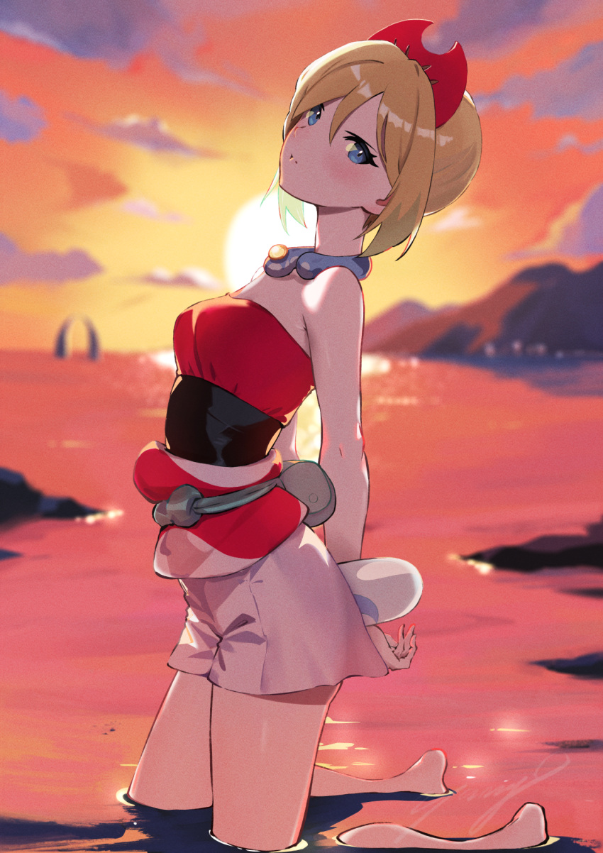 1girl arms_behind_back bare_shoulders barefoot blonde_hair blue_eyes blurry blurry_background blush breasts cloud cloudy_sky commentary_request evening hairband highres irida_(pokemon) kneeling looking_at_viewer ocean orange_sky pokemon pokemon_(game) pokemon_legends:_arceus short_hair shorts sky small_breasts solo sunset wading white_shorts yanagi_(soke_yanagi)