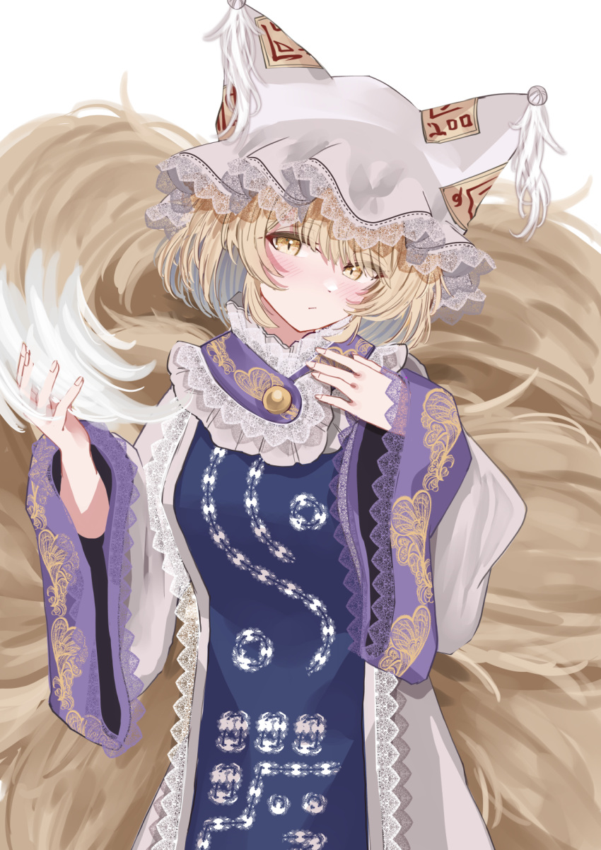 1girl animal_ears blonde_hair blush closed_mouth dress fox_ears fox_tail hat highres long_sleeves mob_cap multiple_tails sarasadou_dan short_hair simple_background solo tabard tail touhou white_background white_dress white_headwear wide_sleeves yakumo_ran yellow_eyes