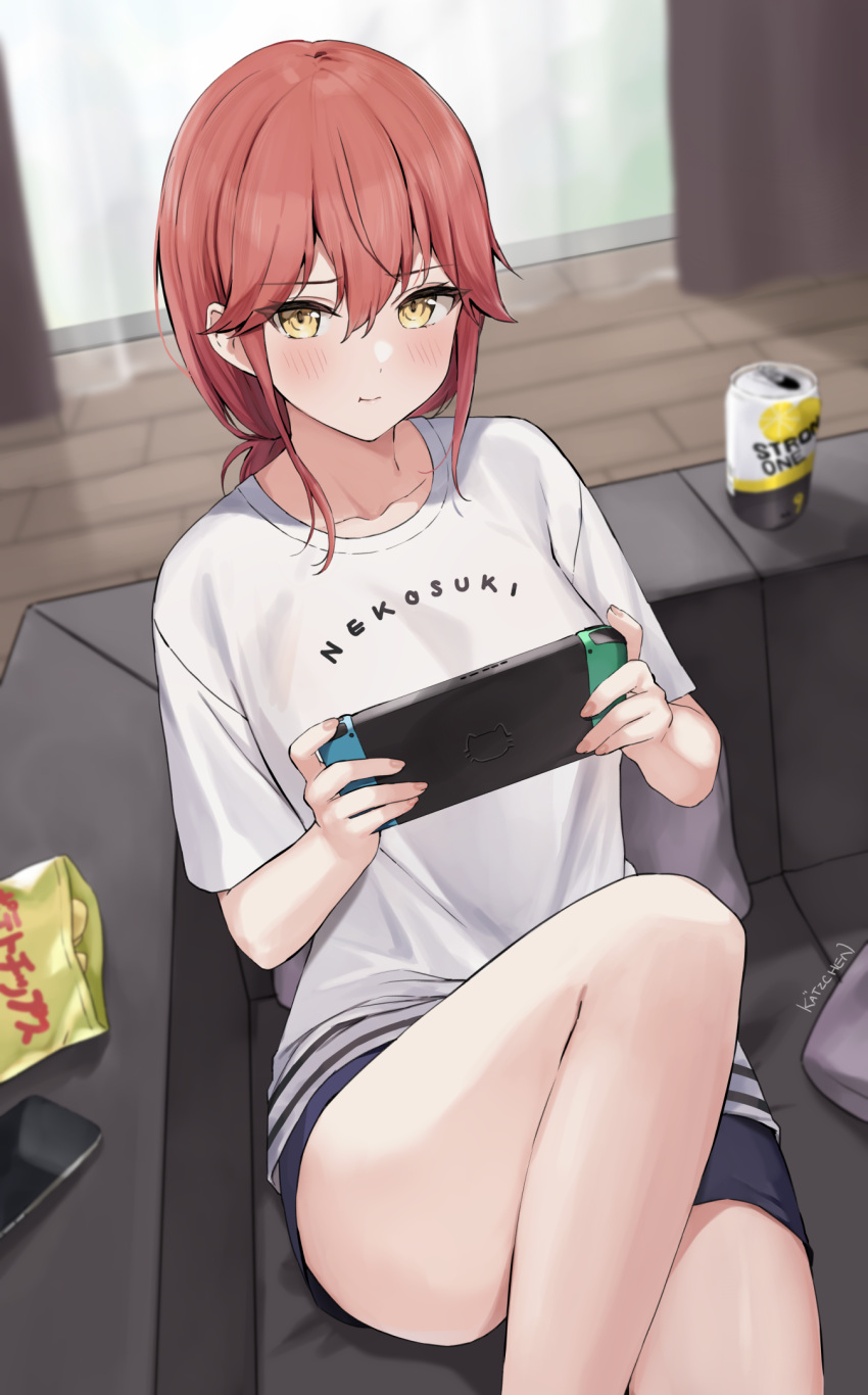 1girl black_shorts blush breasts can cellphone chips_(food) collarbone couch food hair_between_eyes highres indoors kaetzchen large_breasts liliya_(kaetzchen) long_hair looking_at_viewer nintendo_switch original phone potato_chips red_hair revision shirt short_sleeves shorts sitting solo strong_zero thighs white_shirt yellow_eyes