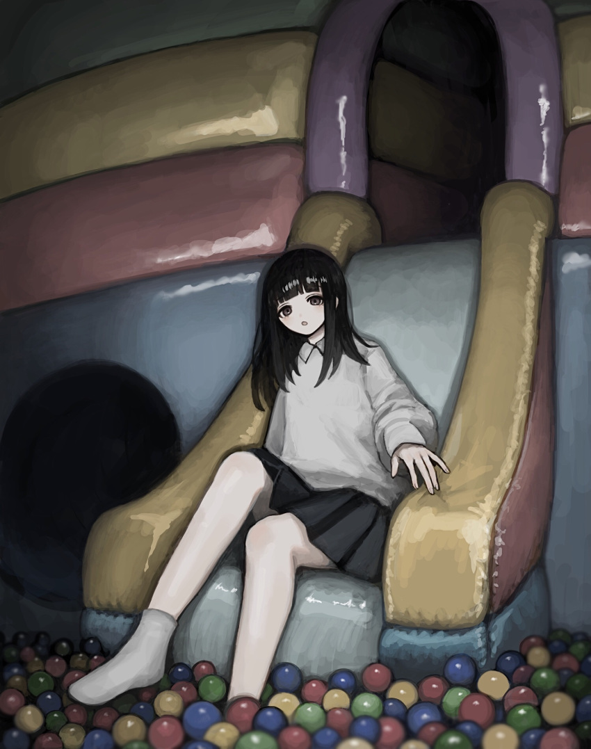 1girl ball ball_pit black_hair black_skirt blunt_bangs brown_eyes collared_shirt grey_shirt grey_socks highres kiro_(ntcm8883) long_hair long_sleeves looking_at_viewer open_mouth original pleated_skirt shadow shirt sitting skirt slide socks solo wide_shot