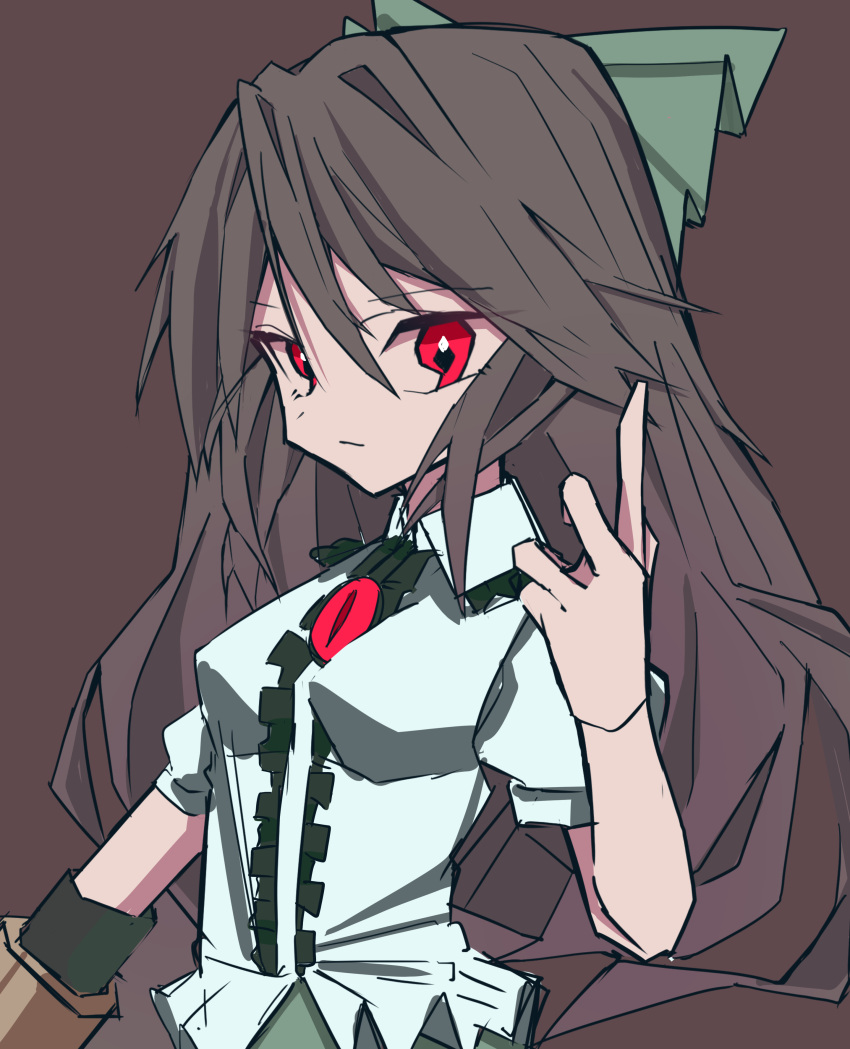 1girl absurdres arm_cannon brown_background brown_hair cannon collared_shirt frilled_shirt frilled_shirt_collar frills green_ribbon green_skirt hair_between_eyes hair_ribbon highres index_finger_raised long_hair looking_at_viewer mizoreshi pointing puffy_short_sleeves puffy_sleeves red_eyes reiuji_utsuho ribbon shirt short_sleeves simple_background skirt third_eye third_eye_on_chest touhou very_long_hair weapon white_shirt