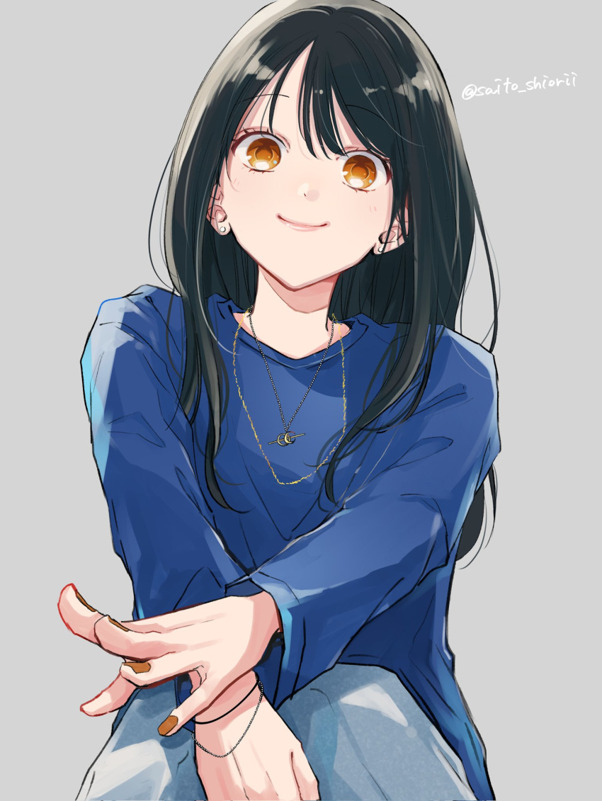 1girl black_hair blue_pants blue_shirt bracelet brown_nails closed_mouth crescent earrings fingernails gold_necklace grey_background hair_over_shoulder highres jewelry long_hair long_sleeves looking_at_viewer multiple_bracelets multiple_necklaces nail_polish necklace orange_eyes original pants pink_lips saitou_shiori_(pixiv14549321) shirt simple_background sitting smile smug solo stud_earrings t-shirt twitter_username