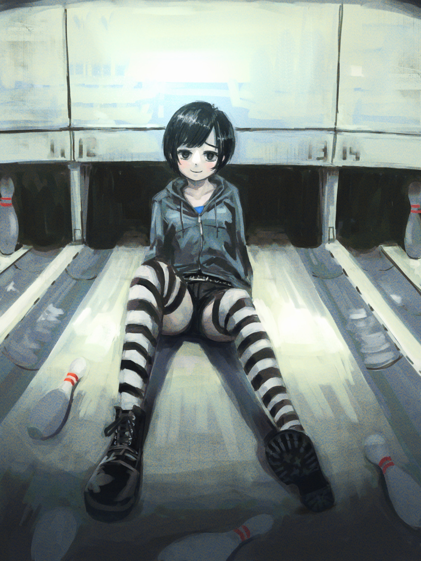 1girl absurdres black_eyes black_footwear black_hair black_shorts boots bowling_alley bowling_pin closed_mouth grey_hoodie highres hood hoodie okura_lino on_floor original scenery shorts smile solo striped striped_thighhighs thighhighs