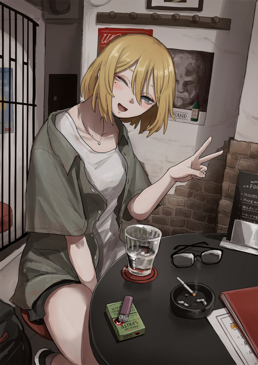 1girl :d absurdres alcohol ashtray blonde_hair blue_eyes cigarette cigarette_pack eyewear_removed highres indoors jewelry lighter mole mole_under_eye necklace one_eye_closed original sake short_hair sitting smile solo tabao v