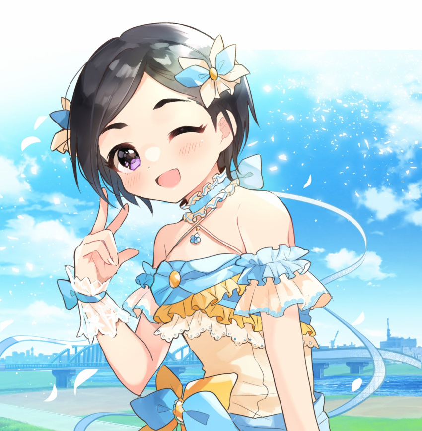 1girl ;d bare_shoulders black_hair blush bow bridge city cloud cloudy_sky day detached_collar dress falling_petals frilled_dress frills hair_ornament hand_up highres idolmaster idolmaster_cinderella_girls idolmaster_cinderella_girls_starlight_stage jewelry lace_trim looking_at_viewer matsuo_chizuru motimotica necklace one_eye_closed open_mouth petals purple_eyes river riverbank scrunchie short_hair sky smile solo thick_eyebrows waist_bow