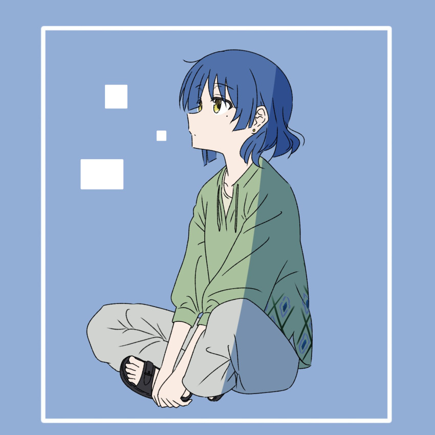 1girl asymmetrical_sidelocks black_footwear blue_background blue_hair blue_theme bocchi_the_rock! border butterfly_sitting collarbone commentary dot_mouth earrings full_body green_shirt grey_pants hands_on_own_feet highres jewelry long_sleeves looking_ahead looking_up mole mole_under_eye oekaki_bibbi pants parted_bangs puffy_long_sleeves puffy_sleeves rectangle sandals shirt short_hair simple_background solo stud_earrings toes white_border yamada_ryo yellow_eyes