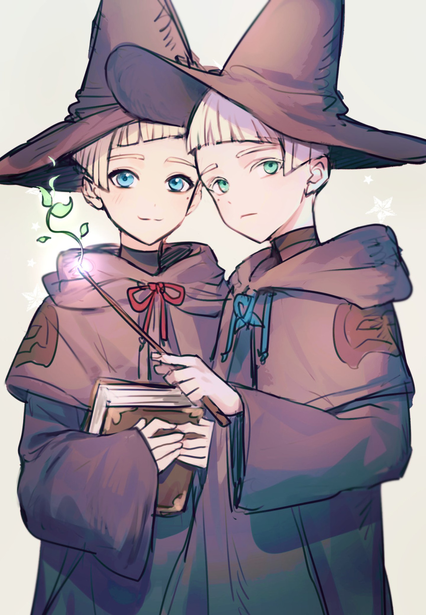 2boys aged_down black_headwear blonde_hair blue_eyes book brothers child diagonal_bangs green_eyes hat highres holding holding_book holding_wand hood hood_down hooded_robe looking_at_viewer magic male_focus millions_knives mole mole_under_eye multiple_boys raku7560 robe short_hair siblings simple_background smile sprout trigun trigun_stampede twins upper_body vash_the_stampede wand white_background witch_hat