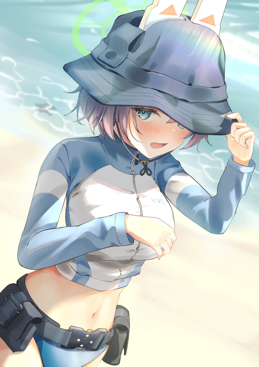 1girl absurdres animal_ear_headphones animal_ears beach belt belt_pouch bikini bikini_bottom_only black_belt blue_archive blue_bikini blue_eyes blurry blush breasts bucket_hat commentary_request cropped_jacket depth_of_field fake_animal_ears green_halo halo hand_up hat hat_tug headphones highres jacket large_breasts long_sleeves looking_at_viewer midriff multicolored_clothes multicolored_jacket nanahoshi_teru ocean official_alternate_costume open_mouth pouch purple_hair rabbit_ear_headphones saki_(blue_archive) saki_(swimsuit)_(blue_archive) short_hair solo standing swimsuit two-tone_jacket utility_belt white_jacket