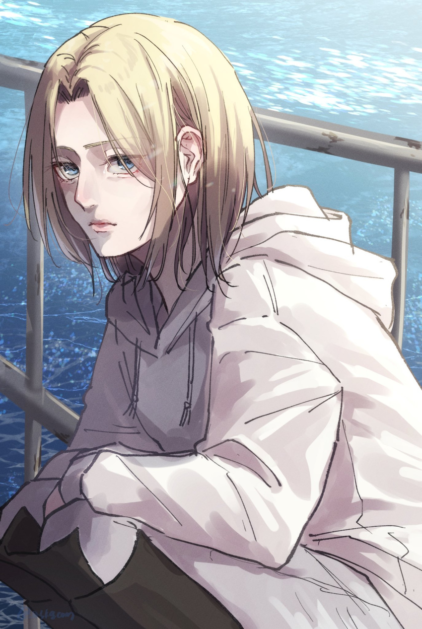 1girl annie_leonhardt askgcom blonde_hair blue_eyes closed_mouth coat expressionless feet_out_of_frame highres hood hood_down hooded_coat long_sleeves looking_at_viewer medium_hair ocean outdoors parted_bangs shingeki_no_kyojin solo squatting white_coat