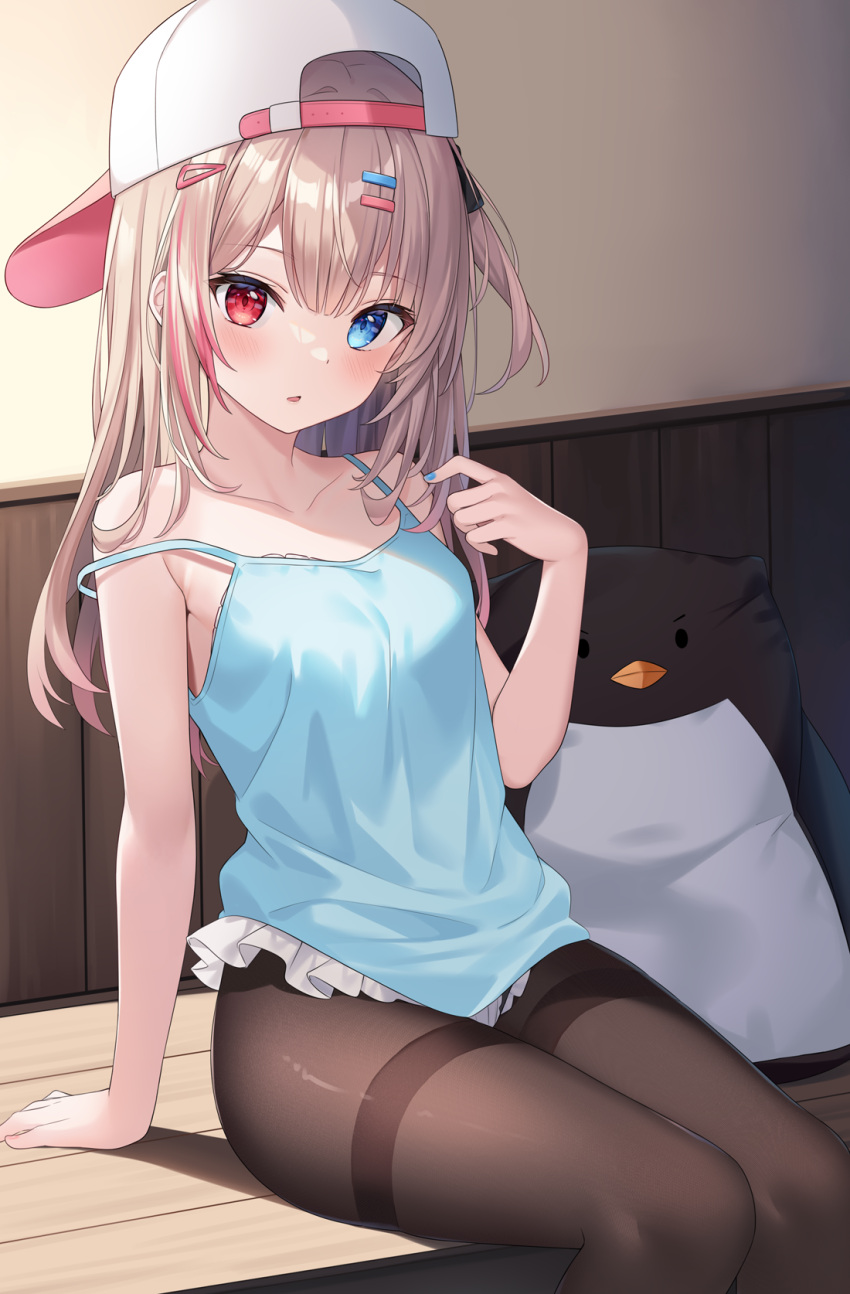 1girl backwards_hat bare_arms bare_shoulders baseball_cap blue_camisole blue_eyes breasts brown_hair brown_pantyhose camisole collarbone feet_out_of_frame hair_between_eyes hair_ornament hairclip hand_up hat heterochromia highres hitsukuya indoors looking_at_viewer meme multicolored_hair original pantyhose parted_lips red_eyes red_hair sitting small_breasts solo streaked_hair thighband_pantyhose white_headwear
