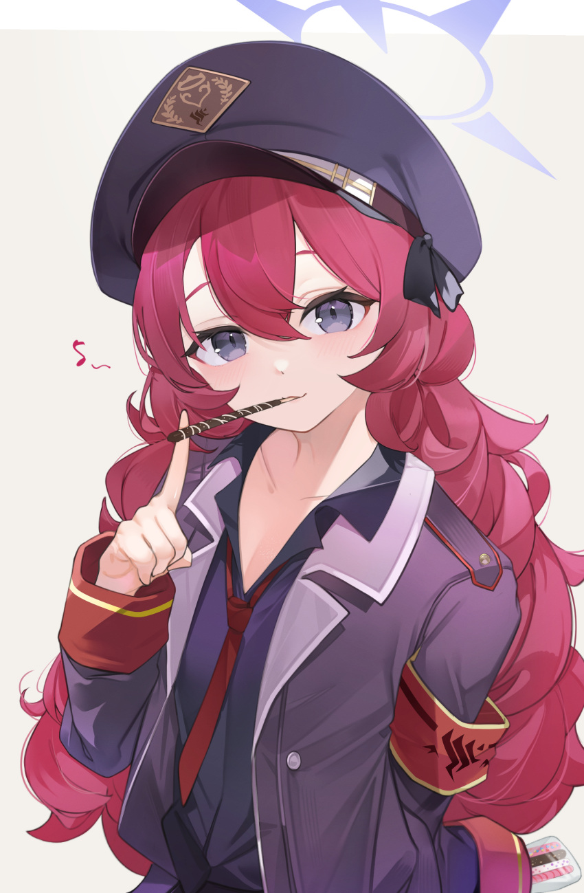 1girl armband black_headwear black_shirt blue_archive blush food food_in_mouth grey_eyes hair_between_eyes halo hat highres holding holding_food holding_pocky index_finger_raised iroha_(blue_archive) jacket long_hair long_sleeves looking_at_viewer military_hat military_jacket mimizuku_(mmiganaru) mouth_hold musical_note necktie peaked_cap pocky pocky_in_mouth purple_halo red_armband red_hair red_necktie shirt simple_background smile solo spoken_musical_note uniform wavy_hair white_background