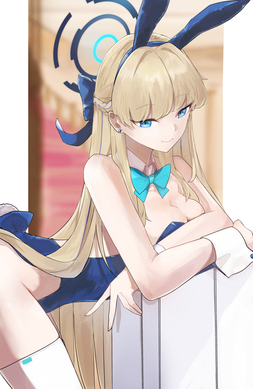 1girl absurdres animal_ears arm_up armpits bare_shoulders blonde_hair blue_archive blue_eyes blue_leotard blush breasts chankuro cleavage closed_mouth detached_collar fake_animal_ears fake_tail hair_ribbon highleg highleg_leotard highres leotard long_hair looking_at_viewer medium_breasts official_alternate_costume playboy_bunny rabbit_ears rabbit_tail ribbon smile solo strapless strapless_leotard tail toki_(blue_archive) toki_(bunny)_(blue_archive) very_long_hair wrist_cuffs