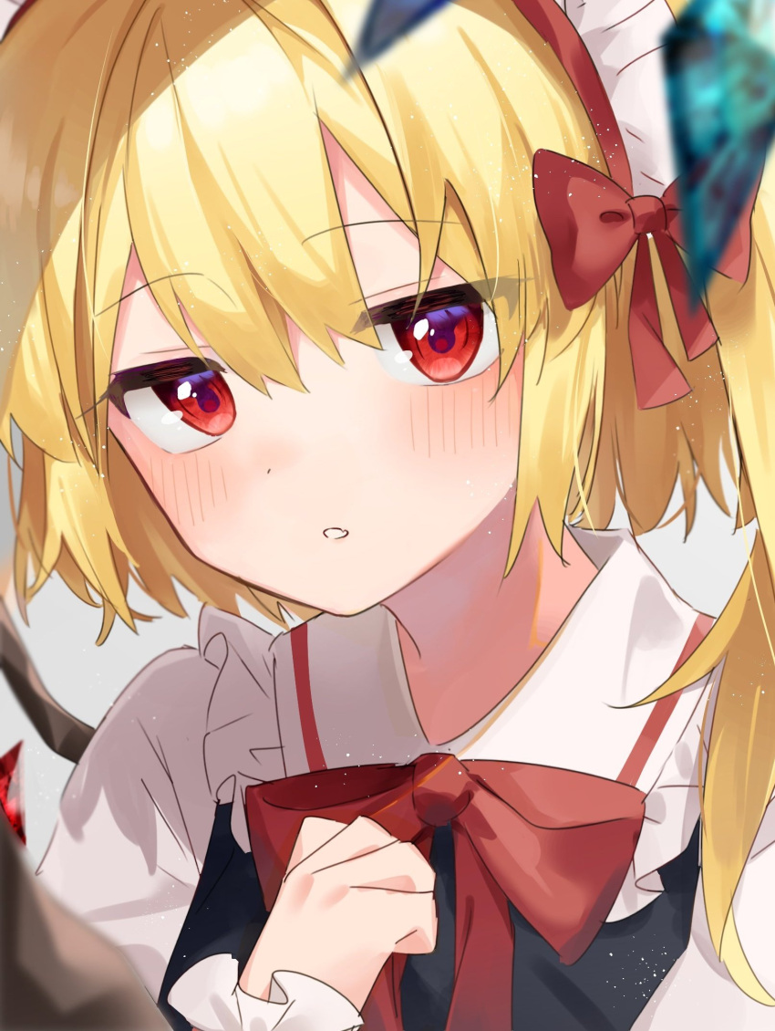 1girl alternate_costume blonde_hair blurry blush bow bowtie close-up crystal depth_of_field enmaided fang flandre_scarlet frilled_shirt_collar frills hair_between_eyes hair_bow half-closed_eyes highres jitome light_particles looking_at_viewer maid maid_headdress one_side_up parted_lips red_bow red_bowtie red_eyes simple_background skin_fang solo suikario touhou wings