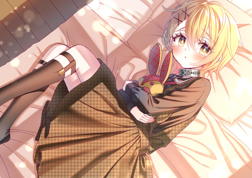 1girl black_collar black_socks blonde_hair buta_no_liver_wa_kanetsu_shiro ceres_(buta_no_liver_wa_kanetsu_shiro) chestnut_mouth collar dress hair_between_eyes hair_ornament holding holding_stuffed_toy indoors knee_strap kneehighs long_sleeves looking_at_viewer lying minami_(apricot_tea) official_art on_bed on_side parted_lips pillow short_hair socks solo stuffed_toy sunlight x_hair_ornament yellow_eyes