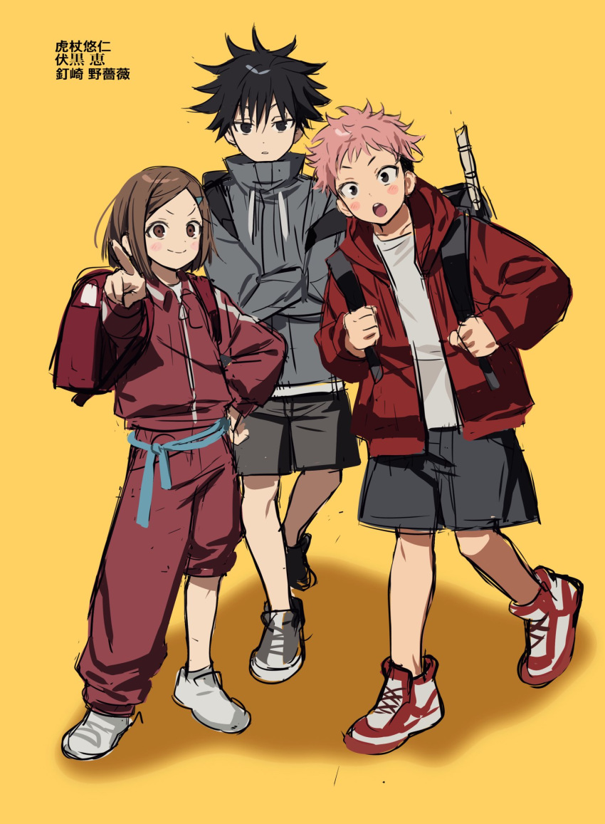 1girl 2boys aged_down backpack bag betti_(xx_betti) black_eyes black_footwear black_hair black_shorts brown_eyes brown_hair closed_mouth crossed_arms fushiguro_megumi grey_jacket highres itadori_yuuji jacket jujutsu_kaisen kugisaki_nobara long_sleeves multiple_boys open_mouth pants pink_hair pointing pointing_at_viewer red_footwear red_jacket red_pants shirt shoes short_hair shorts sketch smile translation_request undercut v-shaped_eyebrows white_footwear white_shirt yellow_background