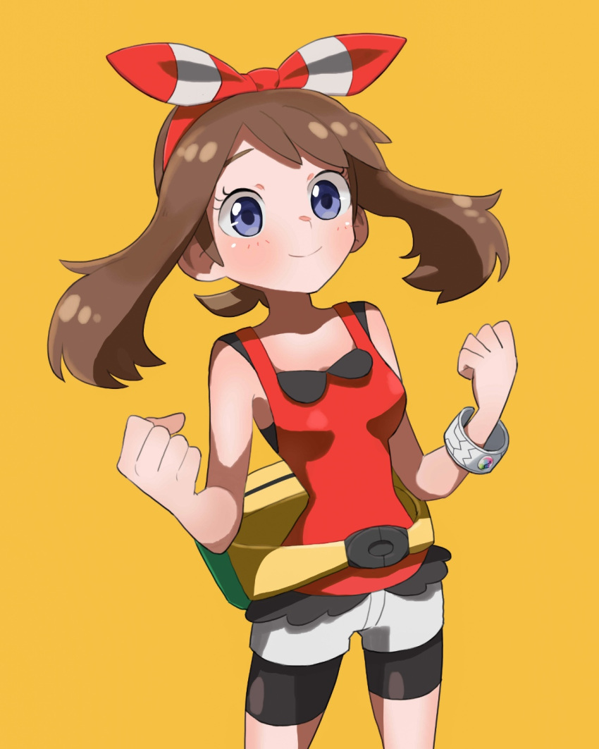 1girl baeming bike_shorts bike_shorts_under_shorts blush bow_hairband bracelet brown_hair clenched_hands closed_mouth commentary_request cowboy_shot eyelashes fanny_pack hairband hands_up highres jewelry korean_commentary may_(pokemon) pokemon pokemon_oras shirt short_shorts shorts sleeveless sleeveless_shirt smile solo white_shorts yellow_background yellow_bag