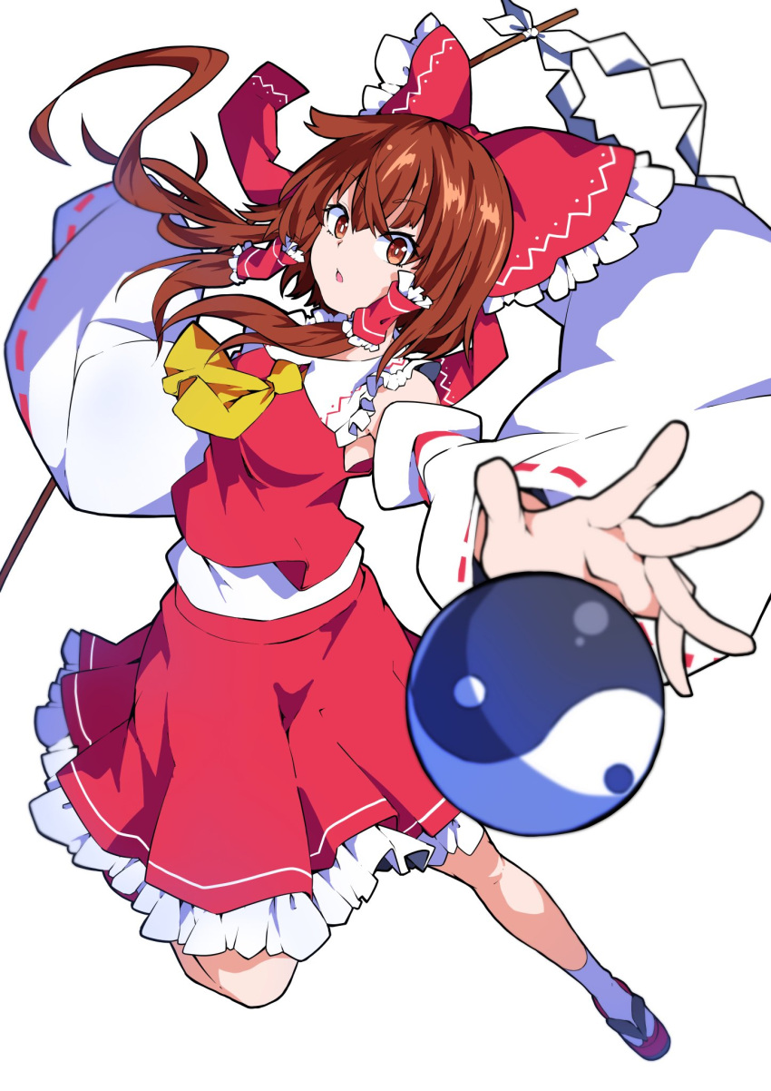 1girl ascot bow breasts brown_eyes brown_hair detached_sleeves foreshortening frilled_bow frilled_hair_tubes frills gohei hair_between_eyes hair_bow hair_tubes hakurei_reimu highres ishimu long_hair looking_at_viewer medium_breasts orb parted_lips red_bow red_skirt ribbon-trimmed_sleeves ribbon_trim simple_background skirt skirt_set solo touhou wide_sleeves yellow_ascot yin_yang yin_yang_orb