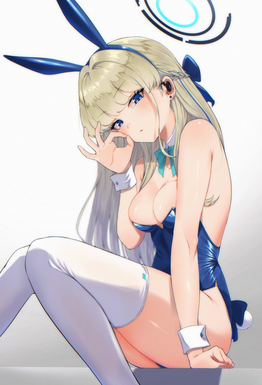 1girl absurdres animal_ears bare_shoulders blonde_hair blue_archive blue_bow blue_eyes blue_hairband blue_leotard bow bowtie braid breasts detached_collar fake_animal_ears hairband halo highleg highleg_leotard highres leotard long_hair medium_breasts official_alternate_costume official_alternate_hairstyle ok_sign playboy_bunny rabbit_ears shooot108 simple_background sitting solo thighhighs thighs toki_(blue_archive) toki_(bunny)_(blue_archive) very_long_hair white_background white_thighhighs wrist_cuffs