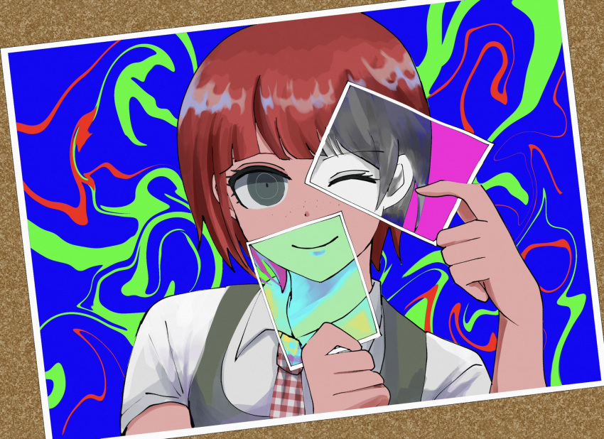 1girl black_eyes blue_background closed_mouth collared_shirt covering_mouth covering_one_eye danganronpa_(series) danganronpa_2:_goodbye_despair dress famima_de_neppuri freckles green_background green_dress highres holding holding_photo koizumi_mahiru multicolored_background necktie one_eye_closed photo_(object) pinafore_dress plaid_necktie red_background red_hair shirt short_hari short_sleeves sleeveless sleeveless_dress solo white_shirt