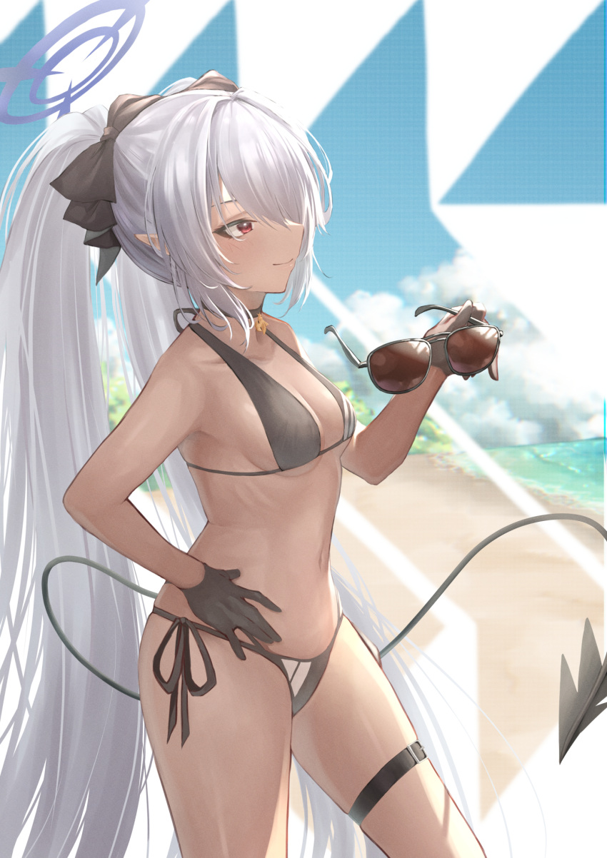 1girl beach belt beruu bikini black_belt black_bikini black_bow black_gloves blue_archive blue_halo blue_sky bow breasts closed_mouth cloud commentary_request dark-skinned_female dark_skin day gloves grey_hair hair_bow hair_over_one_eye halo hand_on_own_hip highres holding holding_eyewear iori_(blue_archive) iori_(swimsuit)_(blue_archive) long_hair medium_breasts navel ocean official_alternate_costume outdoors red_eyes side-tie_bikini_bottom sky smile solo standing sunglasses swimsuit tail thigh_belt thigh_strap twintails very_long_hair