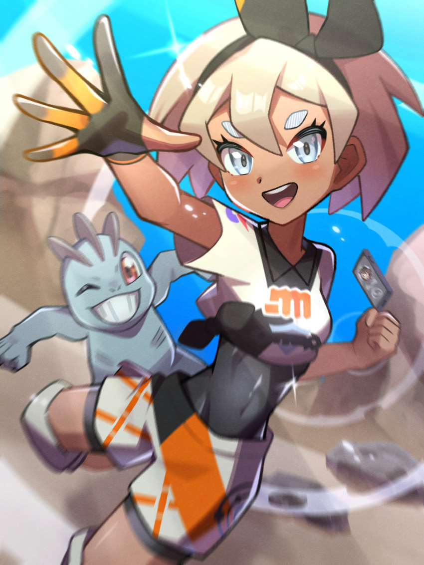 1girl :d bea_(pokemon) black_bodysuit black_hairband blonde_hair blurry bodysuit bodysuit_under_clothes bow_hairband cellphone clenched_hand collared_shirt commentary_request covered_navel day depth_of_field gloves grey_eyes hairband highres inana_umi knee_pads leg_up looking_at_viewer machop open_mouth outdoors partially_fingerless_gloves phone pokemon pokemon_(creature) pokemon_(game) pokemon_swsh print_shirt print_shorts shirt short_hair short_sleeves shorts side_slit side_slit_shorts single_glove smile solo spread_fingers teeth tongue upper_teeth_only