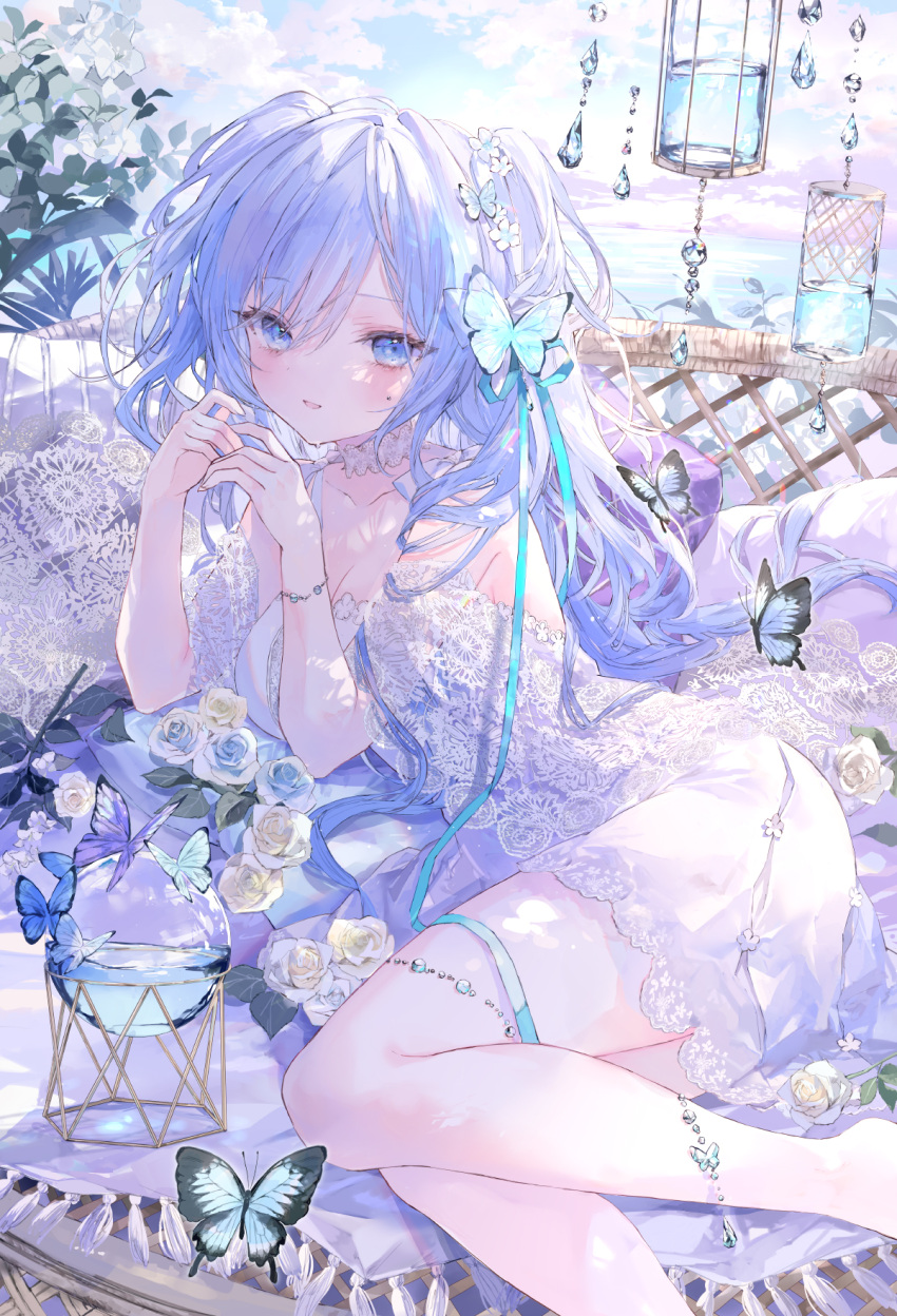 1girl bare_shoulders blue_eyes blue_hair blue_ribbon blue_sky butterfly_hair_ornament cloud cloudy_sky collarbone commentary day dress english_commentary feet_out_of_frame flower hair_between_eyes hair_flower hair_ornament hands_up highres horizon long_hair looking_at_viewer ocean onineko original outdoors parted_lips pillow ribbon see-through sky solo two_side_up very_long_hair water white_dress white_flower