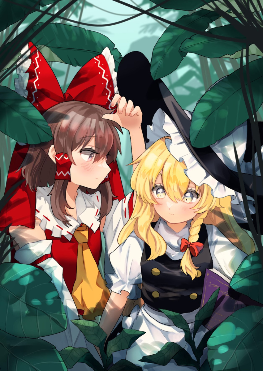 2girls apron ascot black_headwear black_vest blonde_hair blush book bow braid brown_eyes brown_hair closed_mouth frilled_apron frills hair_between_eyes hair_bow hair_tubes hakurei_reimu hat highres japanese_clothes kirisame_marisa long_hair multiple_girls nontraditional_miko red_bow shirt short_sleeves sidelocks single_braid touhou uchisaki_himari vest waist_apron white_apron white_shirt witch_hat yellow_ascot yellow_eyes