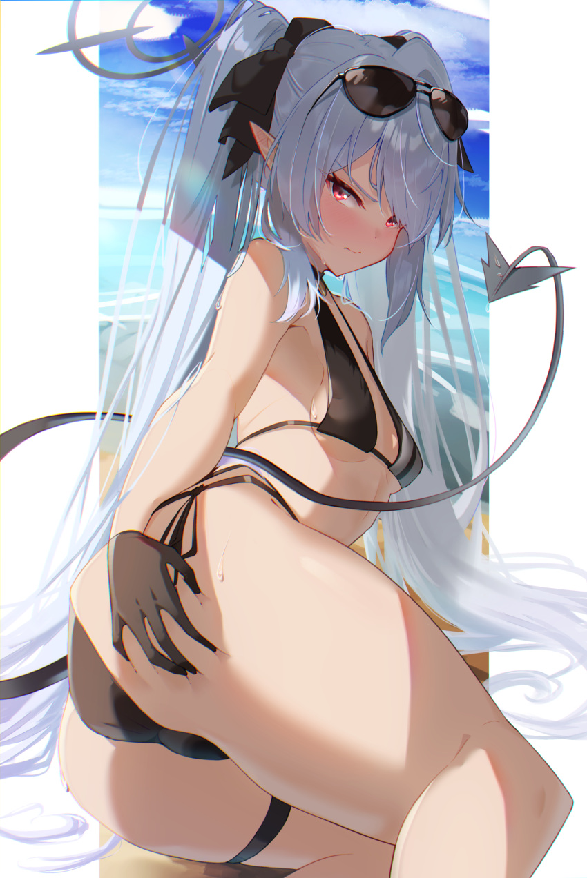 1girl ass bare_arms bare_legs bare_shoulders beach bikini black_bikini black_gloves black_ribbon black_tail blue_archive blush breasts closed_mouth commentary_request dark-skinned_female dark_skin demon_tail eyewear_on_head gloves grey_hair grey_halo hair_ribbon halo hand_on_own_ass highres iori_(blue_archive) iori_(swimsuit)_(blue_archive) long_hair looking_at_viewer ocean official_alternate_costume pointy_ears red_eyes ribbon small_breasts solo sunglasses swimsuit tail thigh_strap twintails wannu