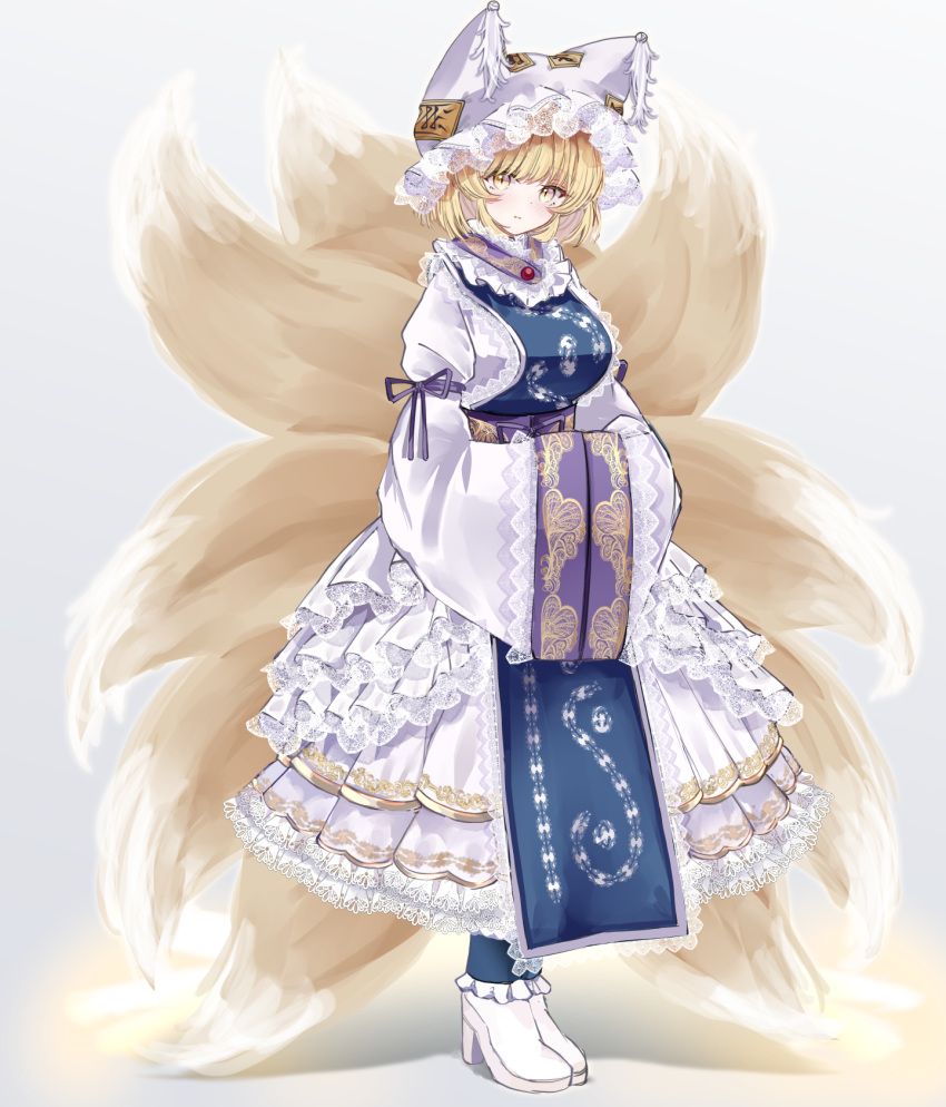 1girl animal_ears blonde_hair closed_mouth dress fox_ears fox_tail full_body hands_in_opposite_sleeves hat highres mob_cap multiple_tails sarasadou_dan short_hair sleeves_past_fingers sleeves_past_wrists solo tabard tail touhou white_dress white_headwear wide_sleeves yakumo_ran yellow_eyes