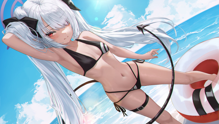 1girl arm_behind_head arm_up armpits bare_arms bare_shoulders beach bikini black_bikini blue_archive breasts cloud demon_tail dutch_angle eyes_visible_through_hair h2o_(dfo) hair_over_one_eye halo halterneck highleg highleg_bikini highres innertube iori_(blue_archive) iori_(swimsuit)_(blue_archive) long_hair looking_at_viewer multi-strapped_bikini navel ocean official_alternate_costume red_eyes side-tie_bikini_bottom small_breasts solo stomach string_bikini swimsuit tail thighs twintails very_long_hair white_hair