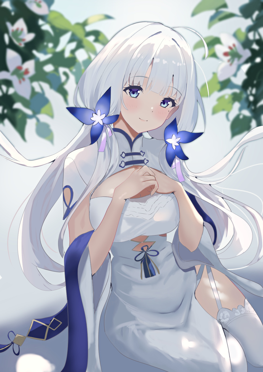 azur_lane blue_hair china_dress chinese_clothes cleavage_cutout clothing_cutout commentary_request cutout_above_navel dress duosix_setsu0408 flower garter_straps hair_flower hair_ornament hands_on_own_chest highres illustrious_(azur_lane) illustrious_(maiden_lily's_radiance)_(azur_lane) long_hair mole mole_under_eye official_alternate_costume own_hands_together pelvic_curtain side_slit thighhighs tri_tails white_dress white_garter_straps white_hair white_thighhighs