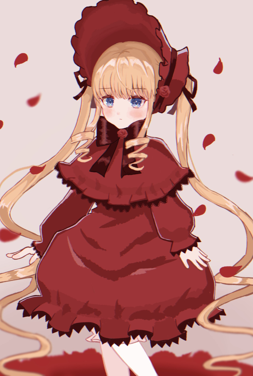 1girl black_bow black_bowtie blonde_hair bloomers blue_eyes blunt_bangs blush bonnet bow bowtie capelet closed_mouth commentary_request dress drill_hair drill_sidelocks expressionless feet_out_of_frame flower_brooch frilled_capelet frilled_dress frilled_sleeves frills grey_background highres lolita_fashion long_hair long_sleeves looking_at_viewer medium_bangs petals quad_drills red_capelet red_dress red_headwear rozen_maiden shinku sidelocks simple_background solo standing stella_(pokopokobanana) twintails very_long_hair white_bloomers
