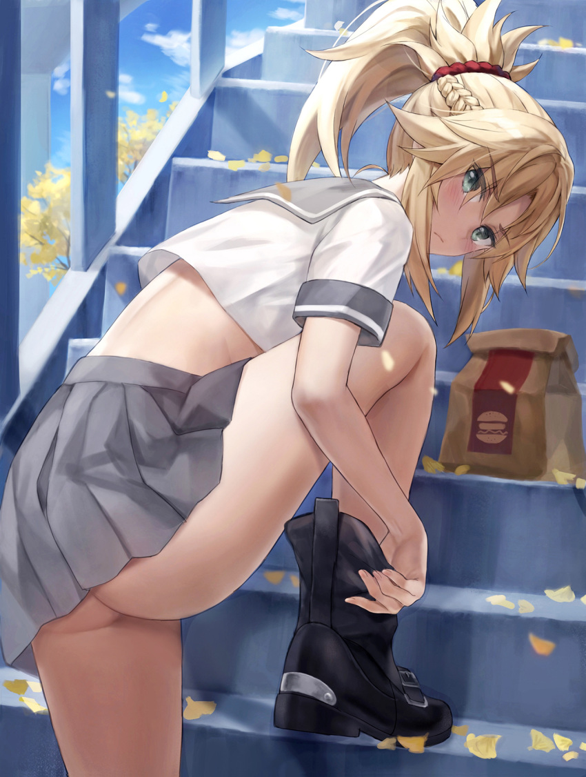 1girl adjusting_footwear ass bag bare_legs belt black_footwear blonde_hair blush boots braid breasts crop_top fate/apocrypha fate/grand_order fate_(series) french_braid green_eyes grey_skirt highres long_hair looking_at_viewer looking_back looking_to_the_side midriff miniskirt mordred_(fate) mordred_(fate/apocrypha) outdoors paper_bag parted_bangs pleated_skirt ponytail red_scrunchie sailor_collar school_uniform scrunchie serafuku sidelocks skirt small_breasts solo stairs thighs tonee
