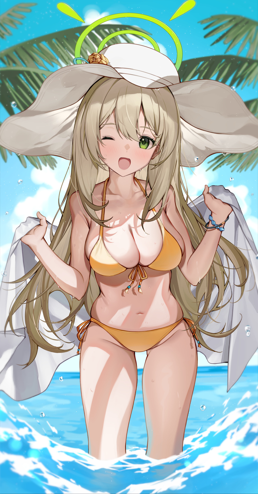 1girl absurdres bikini blonde_hair blue_archive blue_sky breasts cleavage cloud collarbone commentary day front-tie_bikini_top front-tie_top green_eyes green_halo halo halterneck hands_up hat highres holding holding_towel long_hair looking_at_viewer medium_breasts navel nonomi_(blue_archive) nonomi_(swimsuit)_(blue_archive) ocean official_alternate_costume one_eye_closed open_mouth outdoors palm_tree ratto_(ratto_channel) side-tie_bikini_bottom sky smile solo standing string_bikini sun_hat swimsuit towel tree wading white_headwear yellow_bikini