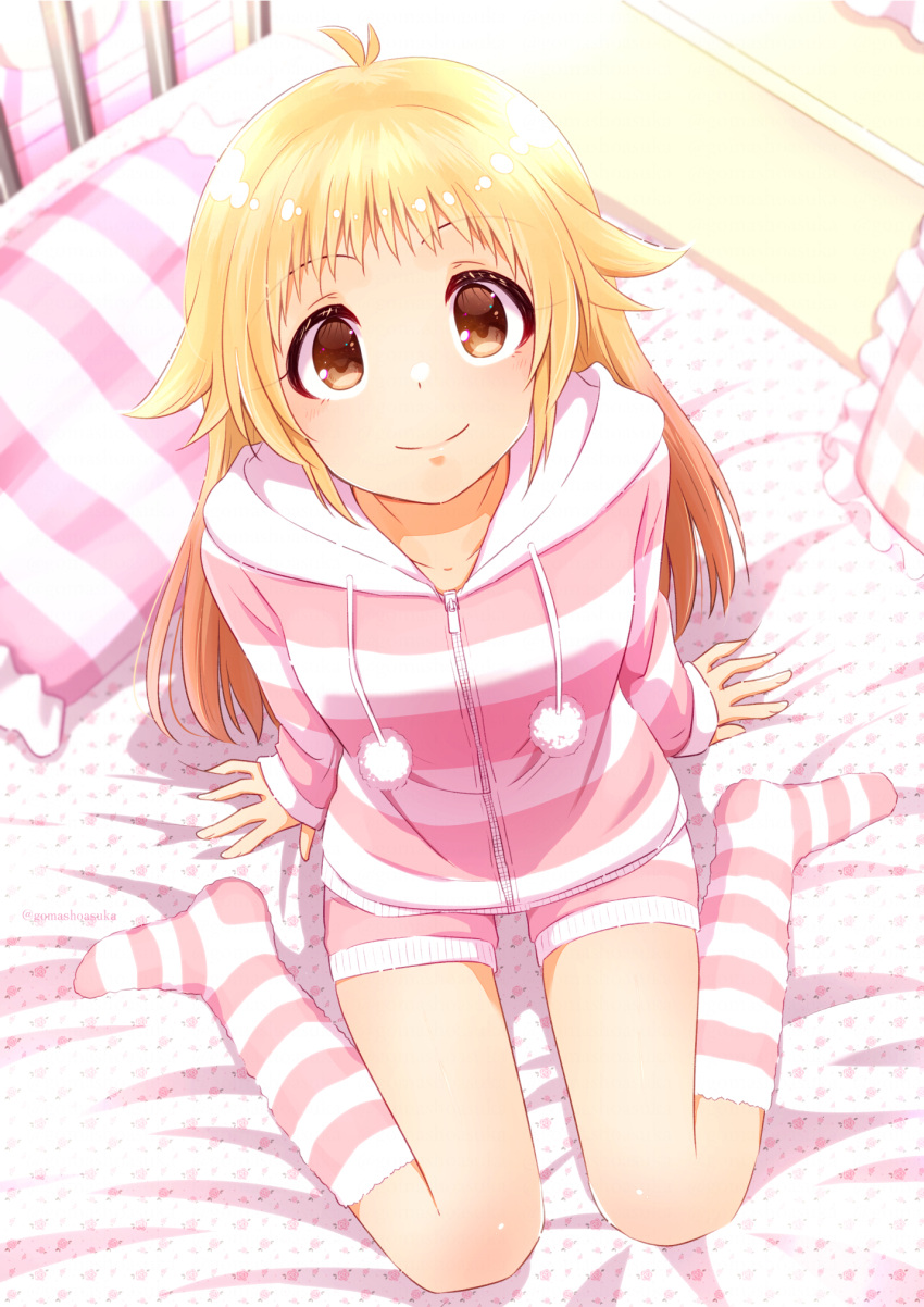 1girl bed blonde_hair brown_eyes full_body gomasho_asuka highres indoors kneehighs long_sleeves on_bed original pillow pink_shirt pom_pom_(clothes) shirt sitting smile socks solo striped striped_shirt striped_socks